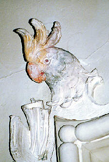 Stuckornament: Papagei