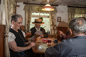 Kartenspieler in der Bauernstube