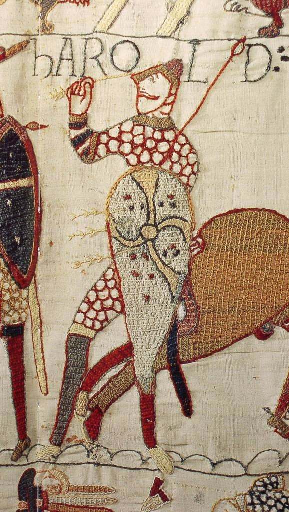 Bildszene aus dem Tepich von Bayeux: Ein normannischer Pfeil dringt Harold Godwinson ins Auge und macht ihn kampfunf�hig